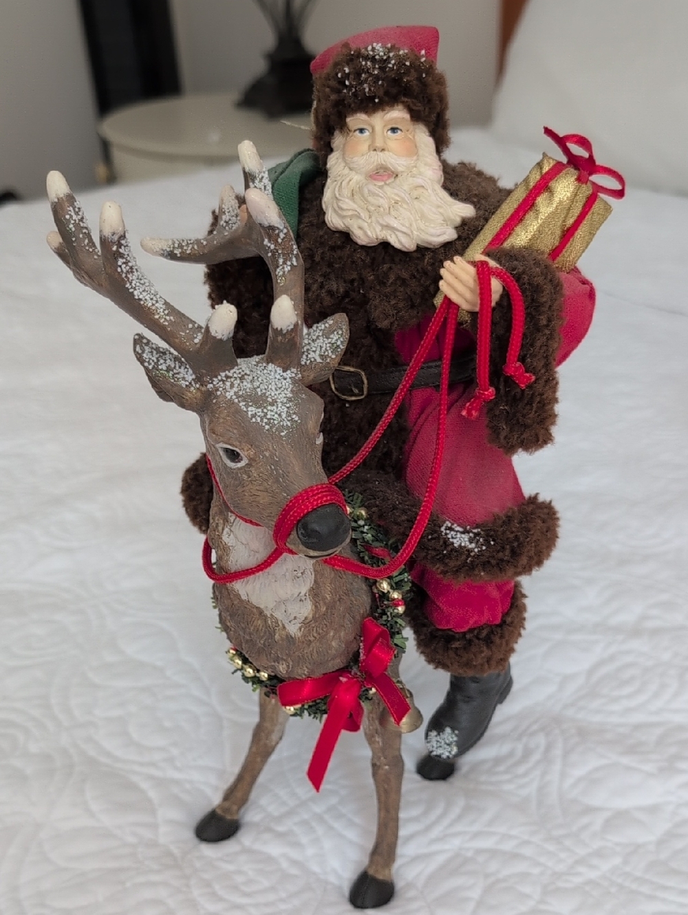 Festive Red Santa with Reindeer Holiday Figurine